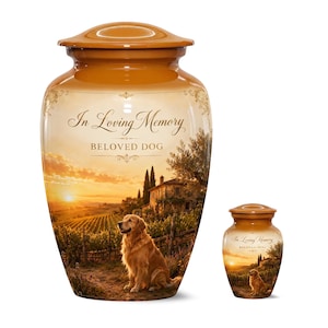 May include: Two urns with a glossy tan finish, each featuring a golden retriever sitting in a vineyard at sunset. The text In Loving Memory and BELOVED DOG is printed on the front. Both vessels have a matching removable lid at the top.