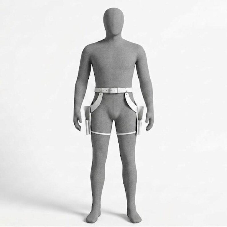 May include: A white leather-style harness worn on a grey mannequin. The accessory features a waist belt connected to two vertical holsters positioned at the thighs, with additional horizontal straps securing each holster around the upper leg area.
