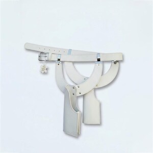 May include: A white leather belt featuring a silver-toned metal buckle and two attached holster-style pockets. The belt includes a small rectangular tag with text hanging from the buckle. The design consists of curved leather straps and silver rivets.