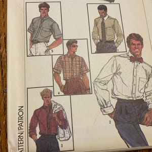 May include: A vintage sewing pattern featuring illustrations of men's shirts in various styles. The images showcase different shirt designs, including short-sleeved and long-sleeved options, with details like collars, pockets, and button arrangements. The pattern is labeled "PATTERN/PATRON".