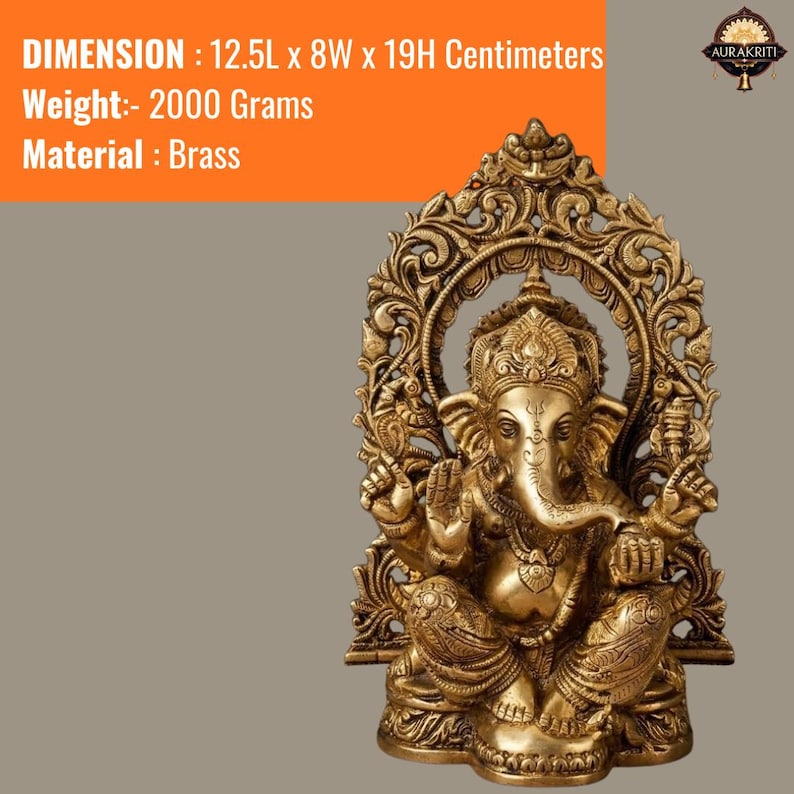May include: A brass Ganesha statue featuring intricate carvings and an ornate archway backdrop. The statue measures 12.5L x 8W x 19H centimeters and weighs 2000 grams. The deity is depicted in a seated position with four arms and a trunk.