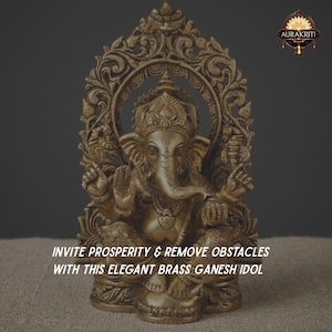 May include: A brass Ganesh idol featuring intricate carvings, a seated posture, and an ornate arched backdrop. The text reads: INVITE PROSPERITY & REMOVE OBSTACLES WITH THIS ELEGANT BRASS GANESH IDOL. The Aurakriti logo is visible in the top right corner.