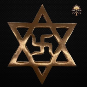 May include: A bronze-colored Star of David with a swastika symbol in the center, set against a black textured background. The star has a geometric design with open spaces. The logo "AURAKRITI" is in the upper right corner.