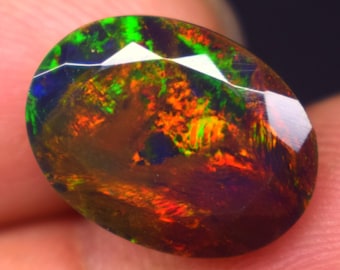 Ethiopian Black Opal Cabochon, Oval Faceted Fire Opal, Loose Gemstone 4.6 CRT.