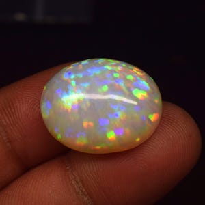 Ethiopian Opal Cabochon: 17.9 Carat Oval Gemstone for Jewelry Making