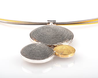 Fantastic choker from the Mediterráneo Collection. Handcrafted in gold and silver. Whith bicolor steel cable. Luis Méndez Artesanos. Spain.