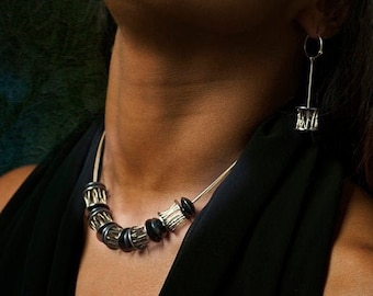 Cages Collection Choker. Handmade with 925 silver and 18K gold thread. Fine and light steel wire chain. Design by Luis Méndez Artesanos.