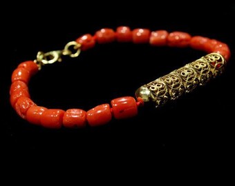 Tubular Bead Bracelet. 18K Gold tube and natural coral beads. Exquisite filigree craft work. Unique jewel. Luis Méndez Artesanos. Spain.