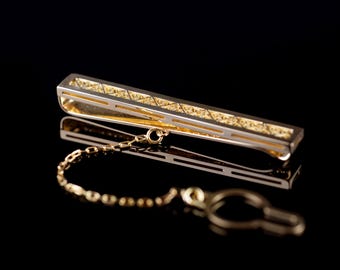 Filigree tie clip