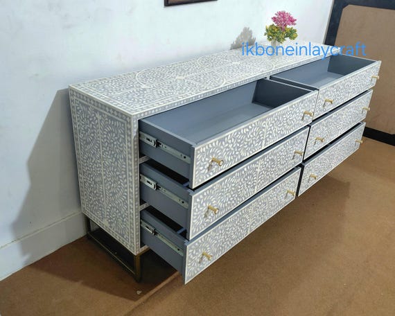 grey dresser with white knobs Stylish Gray 5 Drawer Dresser Elevate your space with this chic gray dresser,  boasting graceful cabriole legs, white ornate knobs, and a striking  appliqu accent. Coming soon to @3_strands_vintage