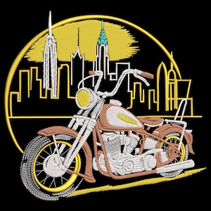 May include: Embroidered design of a brown and white motorcycle with a yellow headlight, set against a yellow and black backdrop of a city skyline. The design features a classic motorcycle style.