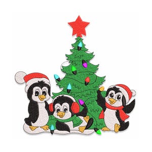 May include: Embroidered design featuring three penguins in winter attire, with a Christmas tree and string lights. The penguins wear Santa hats, earmuffs, and scarves. A red star tops the green tree, creating a festive holiday scene.