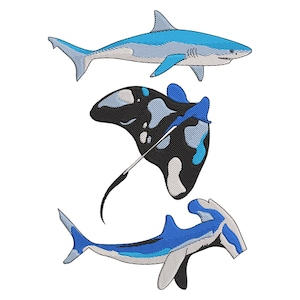 May include: Embroidered design of three sea creatures: a shark, a manta ray, and a hammerhead shark. The shark is light blue with white details. The manta ray is black and white with blue accents. The hammerhead shark is blue and white.