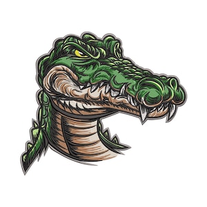 Może przedstawiać: Szczegółowa ilustracja głowy aligatora w kolorach zieleni i brązu. Aligator ma ostre zęby, teksturowaną skórę i skupione żółte oko. Projekt jest prawdopodobnie przeznaczony na odzież lub akcesoria.
