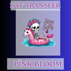 May include: DTF TRANSFER graphic featuring a skeleton with a floral crown, lounging on a pink unicorn floatie in water. The text "Stay Salty" and a butterfly are also included. The words "Pink Bloom" are at the bottom.