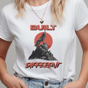 Howling Wolf Graphic Unisex T-Shirt, Built Different Wolf Shirt, Mountain Wilderness Tee, Vintage Wolf Shirt, Retro Animal Graphic Tee