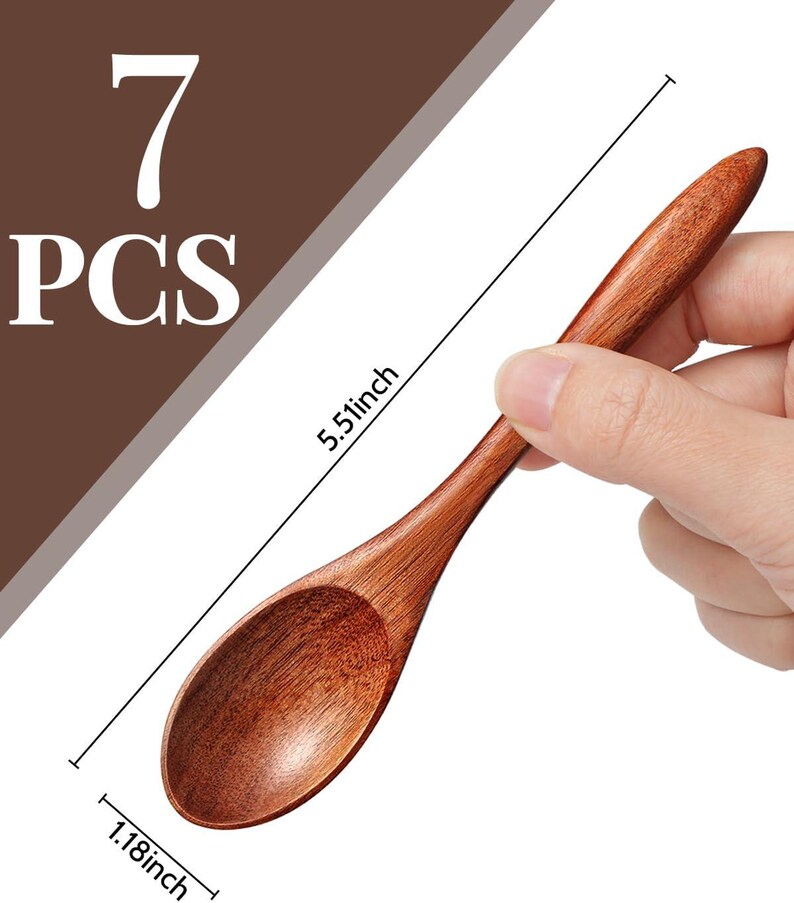 May include: A set of seven wooden spoons. Each spoon is a warm brown color, with a rounded bowl and a long handle. The spoon measures 5.51 inches long and 1.18 inches wide. The text "7 PCS" is in the upper left corner.