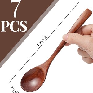 May include: A set of seven wooden spoons. Each spoon is a rich brown color, measuring 7.10 inches long and 1.57 inches wide. The text "7 PCS" is visible in the upper left corner.