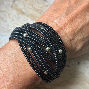 Black glass seed bead memory wire braided cuff bracelet