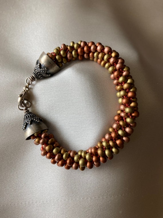 Kumihimo beaded braid bracelet in bronze and coppe
