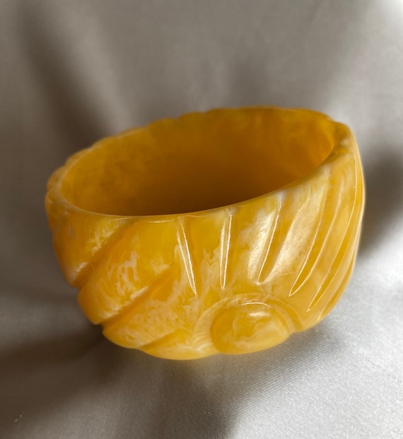 Vintage carved golden yellow Lucite bangle ~ chunk