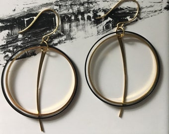 Black and gold hoop earrings. Mixed metal jewelry. Unique hoops