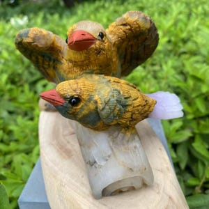 Detailed Hand-Carved Bird Sculpture from Raw Crystal: Nature Transformed by Artistry