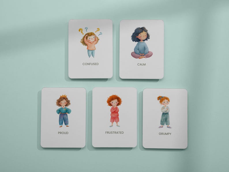 May include: Five white cards with illustrations of children depicting different emotions: Confused, Calm, Proud, Frustrated, and Grumpy. Each card features a watercolor-style drawing of a child and the emotion's name.