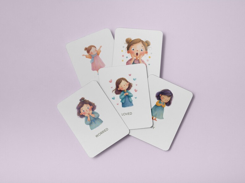 May include: A collection of white cards with illustrations of girls expressing different emotions. The cards include the words "Worried" and "Loved". The illustrations feature girls with various hairstyles and clothing, with soft color palettes and heart accents.