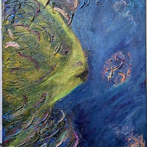 May include: Abstract textured painting with a color palette of blues, greens, and gold. The artwork features a central, organic form in shades of green and yellow, set against a deep blue background with textured details.