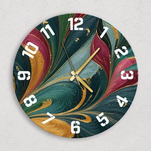 May include: Circular wall clock with an abstract design in teal, gold, burgundy, and blue. White numerals mark the hours, and gold hands show the time. The clock's face has a swirling pattern. A decorative item for any room, measuring approximately 30 cm in diameter.