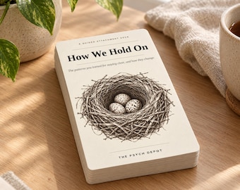 May include: A deck of cards titled How We Hold On: A Guided Attachment Deck. The cover features a black and white ink illustration of a bird's nest containing three speckled eggs. The text The Psych Depot is printed at the bottom of the card.