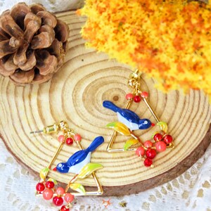 Statement-style magpie and berry earrings