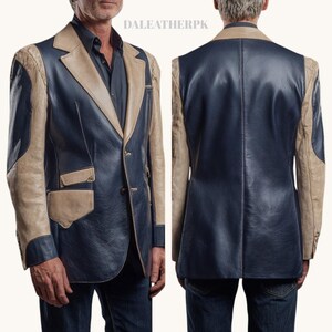 May include: A two-tone blazer featuring a dark navy blue leather body with contrasting beige leather lapels, sleeves, and pocket flaps. The jacket includes a button-front closure and visible stitching details. The text DALEATHERPK is visible.