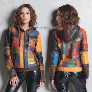 May include: A multi-colored leather jacket with a patchwork design. The jacket features a hood, a zipper closure, and a variety of colors including black, yellow, red, blue, and purple. The text "DALEATHER.PK" is visible on the jacket.