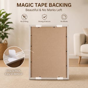 May include: A rectangular picture frame with a light gray border and a brown backing. The frame features "MAGIC TAPE BACKING" with the text "Beautiful & No Marks Left". The image also shows the text "Easy to Stick, Easy to Remove".
