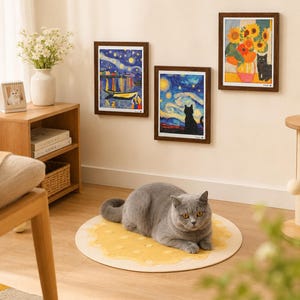 May include: Three framed art pieces depicting starry night scenes and sunflowers with a black cat. A gray cat rests on a yellow and white circular rug. A wooden side table with a white vase of flowers is in the background.