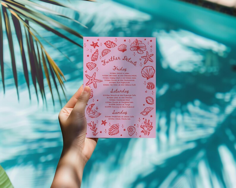 May include: A pink invitation with the words "Further Details" and event information, decorated with red seashell and starfish illustrations. The invitation is held in front of a turquoise pool.