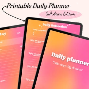 May include: A digital daily planner with a gradient pink and orange background. The text "Printable Daily Planner" and "Soft Aura Edition" are at the top. The planner includes sections for daily reflection and goal setting. The phrase "Little steps, big dreams" is also visible.