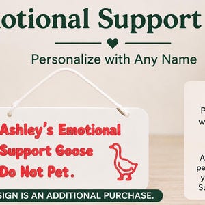 May include: A rectangular white hanging sign with a white cord, featuring red text that reads "Ashley's Emotional Support Goose Do Not Pet." and a red line-art illustration of a goose. The sign is displayed alongside text about personalization.
