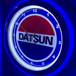 Datsun Motors OldLogo Auto Garage Bar Man Cave Blue Neon Style LED Retro Wall Clock Advertising Sign
