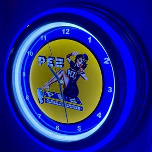 Pez Candy Dispenser Pin Up Girl Store Bar Man Cave Blue Neon Style LED Retro Wall Clock Advertising Sign
