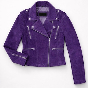 May include: A striking purple suede biker jacket. It has a notched collar, an asymmetrical zip, multiple zipped pockets, and silver-tone hardware. The jacket is tailored with long sleeves. The measurements are in centimetres.