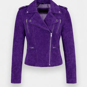 May include: A striking purple suede jacket with an asymmetrical zip. It has a notched collar, multiple zipped pockets, and silver-tone hardware. This long-sleeved jacket is a fashionable outerwear choice.
