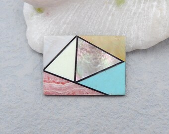 May include: Geometric rectangular mosaic with a variety of colors. The mosaic features a light pink, light blue, cream, and iridescent shell pattern, separated by black lines. The mosaic is set against a white and gray background.