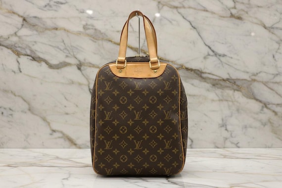 Authentic LOUIS VUITTON Monogram Excursion Shoe B… - image 1