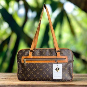 Authentische Louis Vuitton Cite MM Tasche