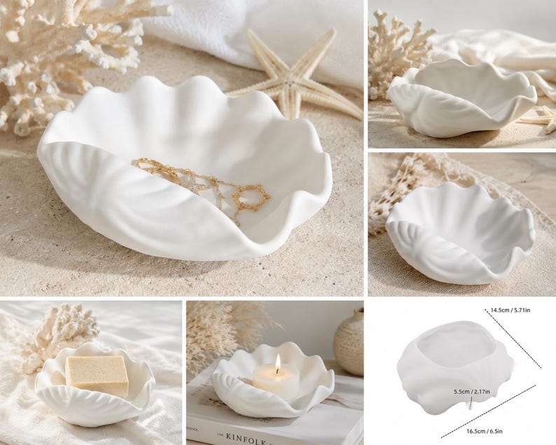 May include: A white ceramic dish shaped like a clam shell with a matte finish. The dish features a scalloped edge and a curved interior. A diagram shows the dimensions as 5.71 inches by 6.5 inches with a height of 2.17 inches.