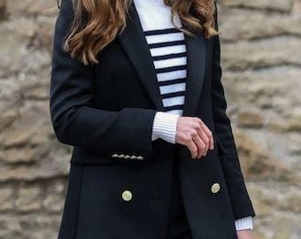 Traje negro de mujer a medida: chaqueta cruzada y pantalón