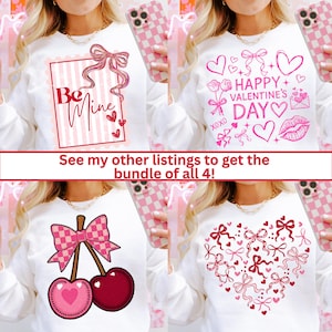 May include: Four white sweatshirts with Valentine's Day themed designs. One features a bow and the words "Be Mine." Another says "Happy Valentine's Day" with hearts and a kiss. The third has cherries and a bow, and the last has a heart made of bows.